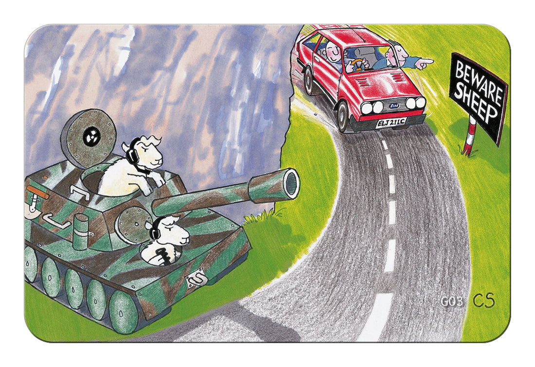 A rectangular illustrated mat or sign with rounded corners, showing a cartoon scene of a sheep in a green tank on a winding road, with a red car and a black 'Beware Sheep' sign nearby. The artwork fills most of the product area and is photographed against a plain white background.