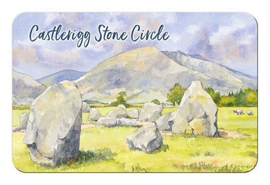 A rectangular fridge magnet with rounded corners featuring a watercolour landscape of Castlerigg Stone Circle, with large stone circles in a grassy field and mountains under a cloudy sky. The text 'Castlerigg Stone Circle' appears across the top.