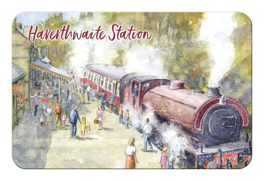 A rectangular watercolour-style print featuring Haverthwaite Station and a vintage train, with the words 'Haverthwaite Station' written across the top. The artwork shows a bustling station platform with people, a red and cream train, trees, and steam.